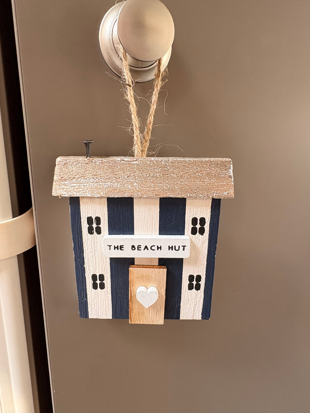 The Beach Hut Wooden Hanger 07511F07-7CD5-4B4C-960B-02B9962D2E4F
